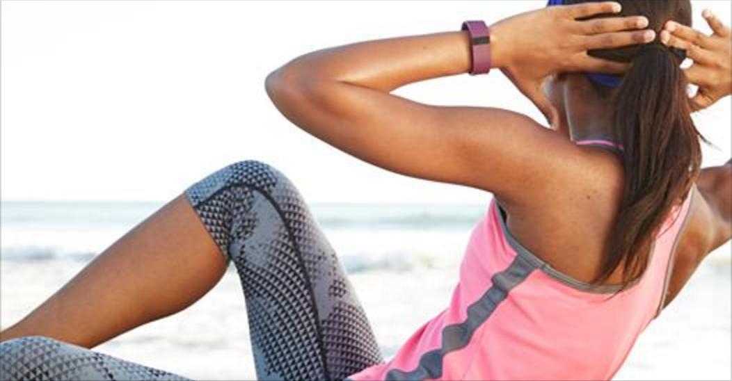 wearing apple watch and fitbit